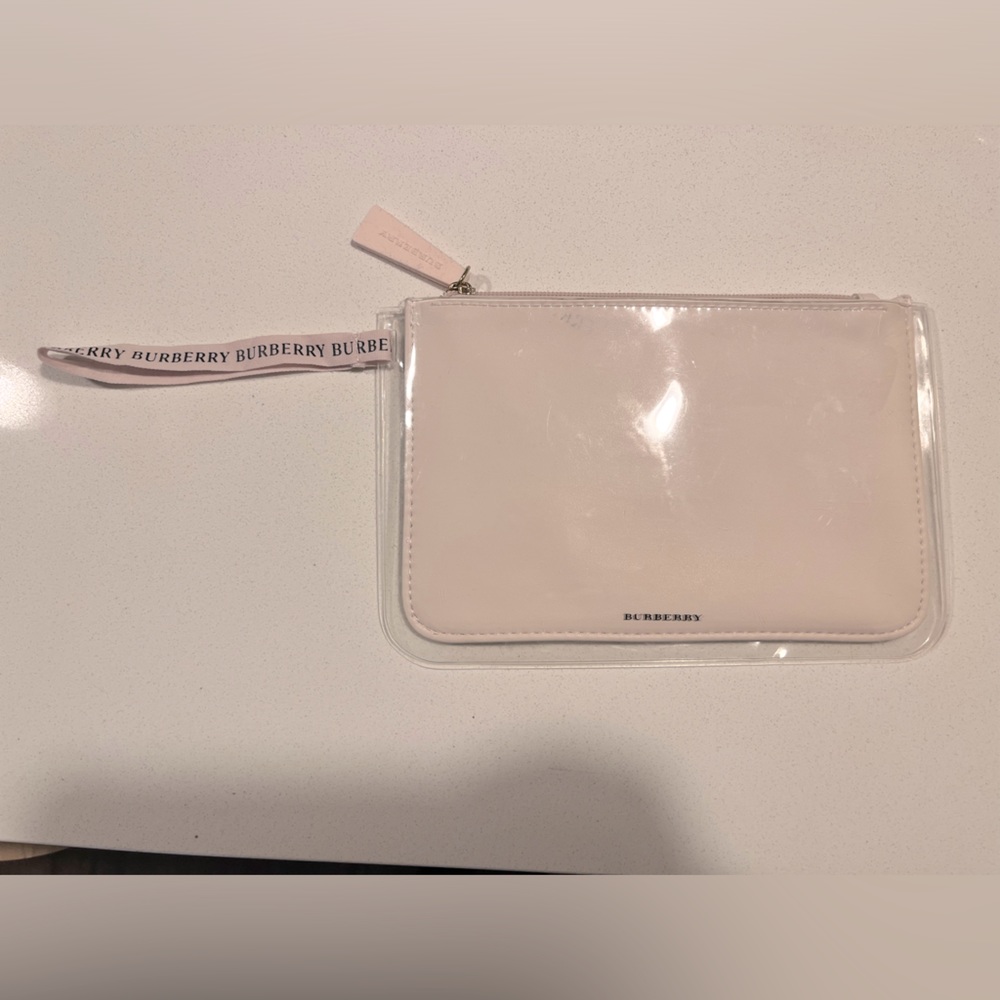 *Used Burberry travel makeup bag/wristlet . Good condition